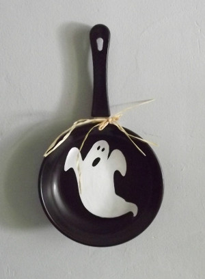 Ghost painted inside of case iron skillet.