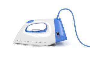 Blue and white clothes iron.