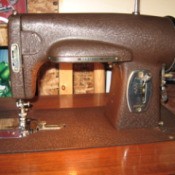 Dark brown vintage sewing machine.