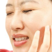 A woman with sensitive teeth.
