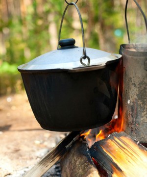 A pot cooking over a fire.