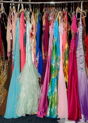 Closet full of prom dresses.