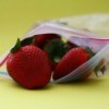 Freezer bag full of strawberries.
