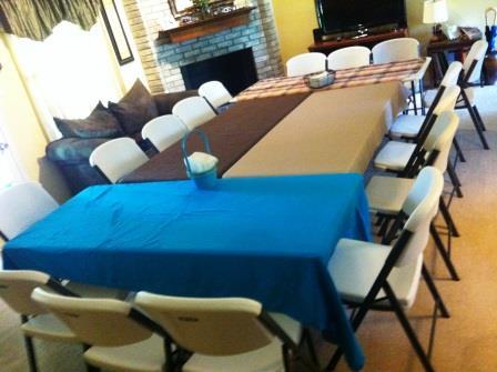 Tables set up for a group meal.