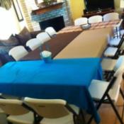 Tables set up for a group meal.