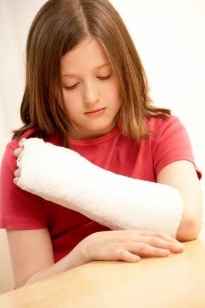 A girl with a broken arm.