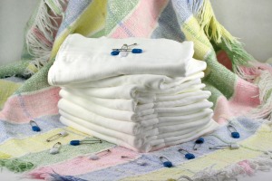 A stack of a cloth diapers.