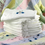 A stack of a cloth diapers.