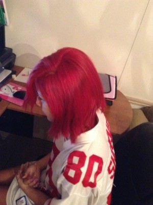 Girl with bright red hair.