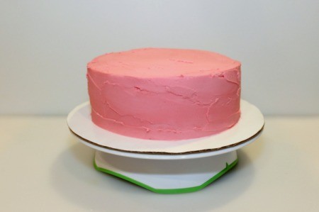 Mint Chocolate Chip Ice Cream Cake - smooth out icing