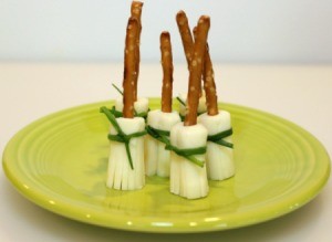 broom sticks standing on plate