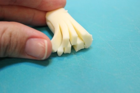 separate cheese strands