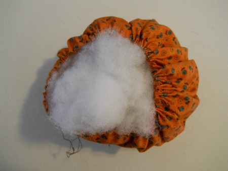 Stuffing yo yo pumpkin,