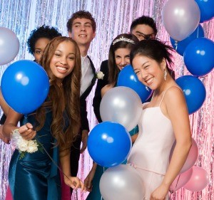 A group of teens at a homecoming dance.