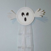 paper plate ghost on wall