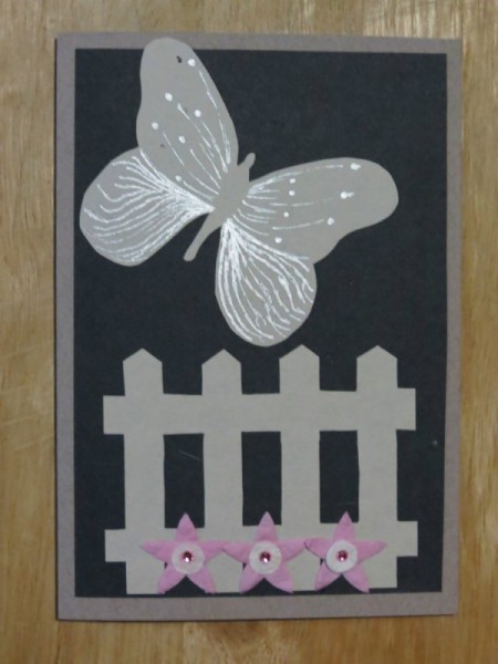 Flowers and butterfly detail added.