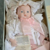 Baby doll in box.