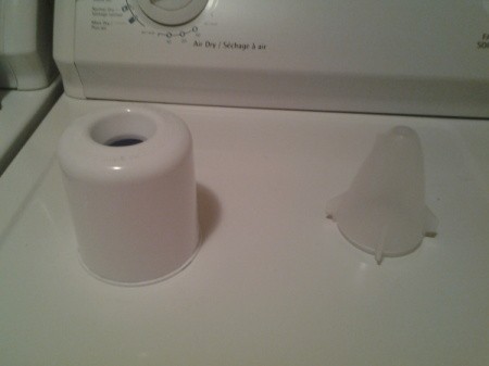 Dispenser sitting on tip of dryer.