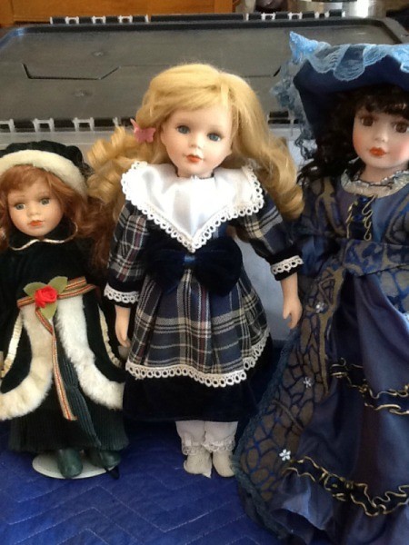 Doll with plaid dress.