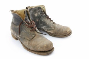 A pair of dirty work boots.