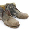 A pair of dirty work boots.