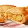 A piece of apple pie with crispy crust.