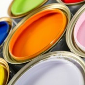 Cans of different colored paint.
