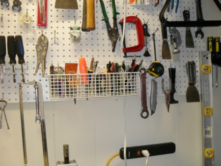 Basket to store tools on tool wall.