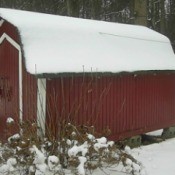 Snow covered shed.