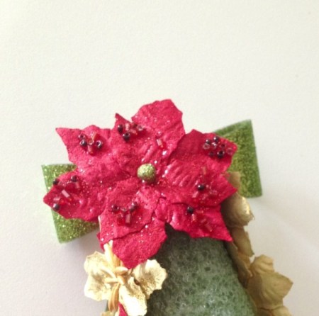 Cover twist tie with poinsettia.