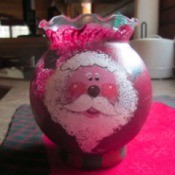 Santa painted on bud vase.