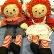 Cloth Raggedy Ann and Andy dolls.