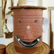 A recycled tin can man.