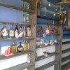 Shelves with bottles.