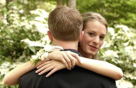 A girl with her prom date.