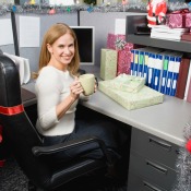 A cubicle decorated for Christmas.