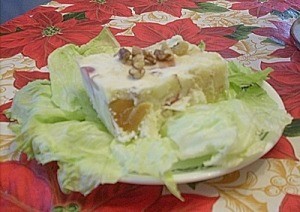 Piece of salad on bed of lettuce.