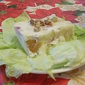 Piece of salad on bed of lettuce.