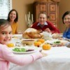 A family eating Thanksgiving dinner.