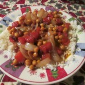 Serving of chickpea curry over rice.