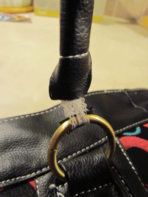 Closeup of purse strap.