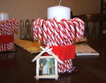 Candy canes with candle in center.