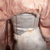 Tag on back of doll.
