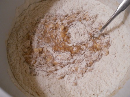 Mixing dry with wet ingredients.
