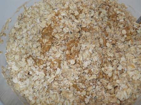 Adding oatmeal to flour and wet mixture.