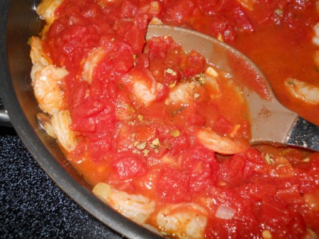 After addition of tomatoes and spices.