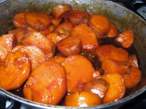 Sliced potatoes in skillet.