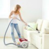 Woman Using Vacuum Cleaner