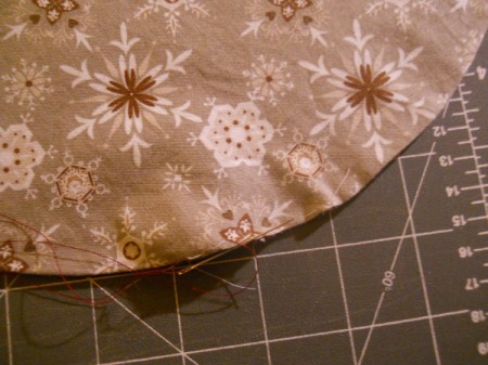 Stitcing the turning opening closed.