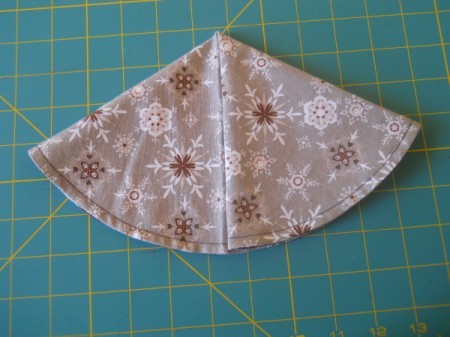 Folding half circle into thirds.